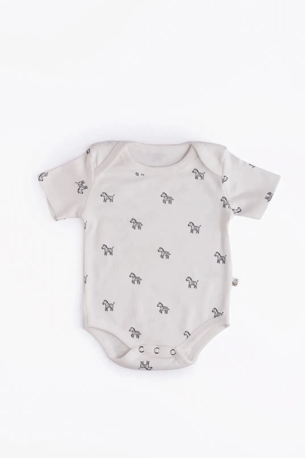 Half sleeve black pattern in white bodysuit for baby