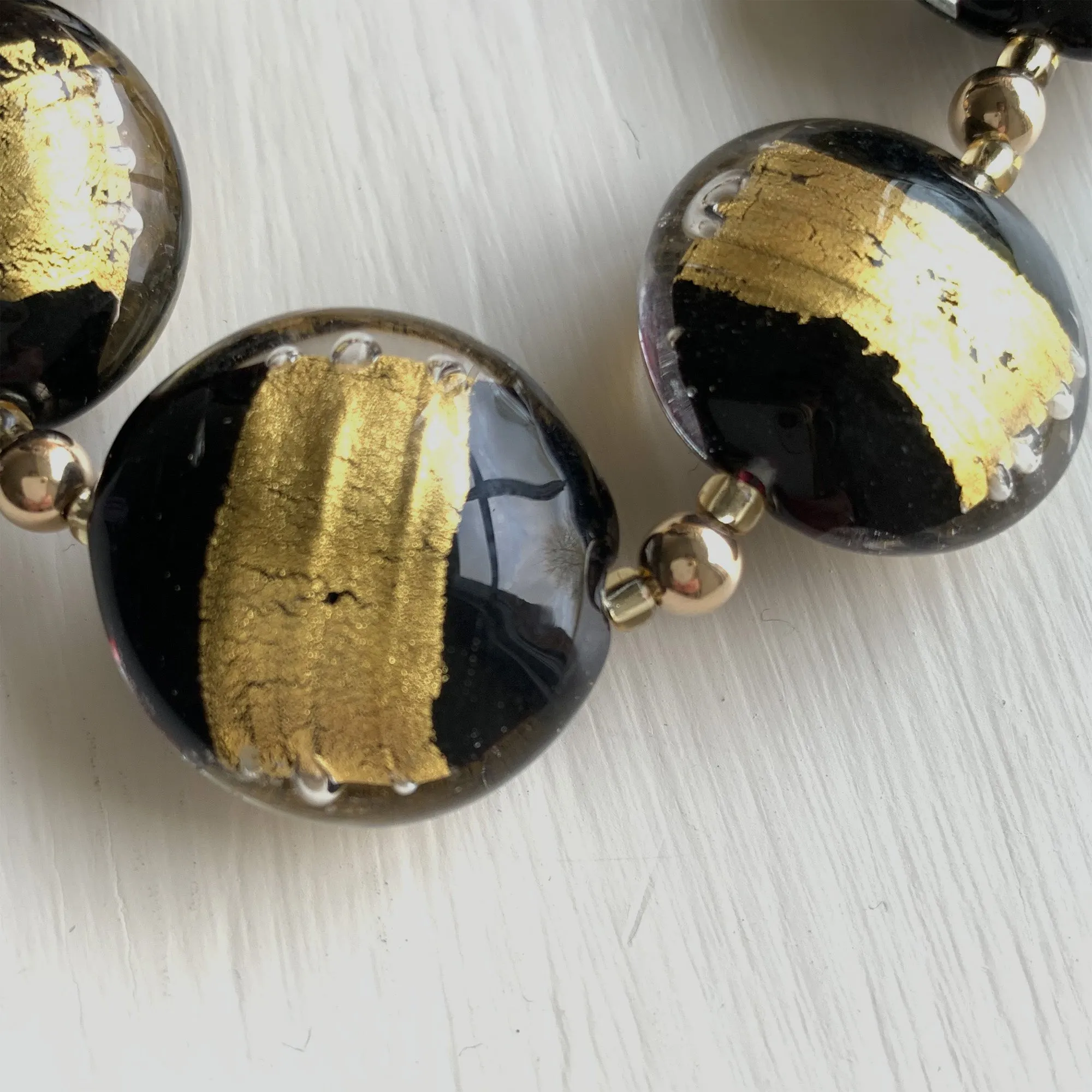 Necklace with black pastel striped in gold Murano glass large lentil beads on gold